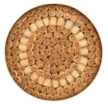 Round tray of pine and mixed nuts baklava rolls hand-rolled in thin dough by Zalatimo Brothers